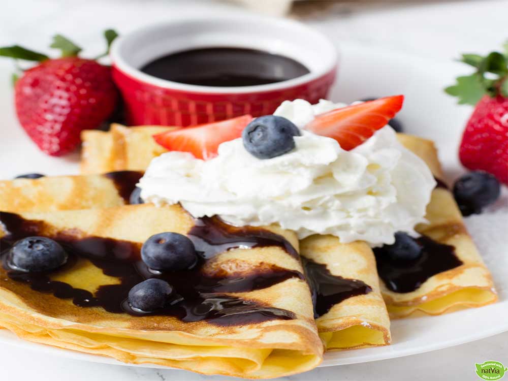 FRENCH CREPES WITH WHIPPED CREAM AND BERRIES